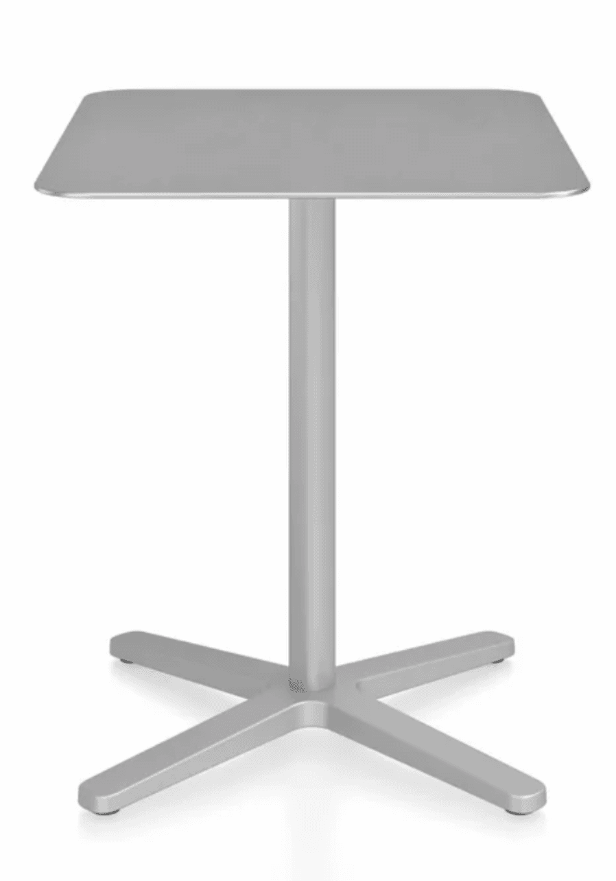A modern, minimalist square table featuring a flat, square top with subtly rounded edges, supported by a central cylindrical pedestal, which connects to a stable four-pronged star-shaped base. The entire table is finished in a uniform matte silver-gray color, indicating a metallic construction, likely aluminum or powder-coated steel. — 3D model