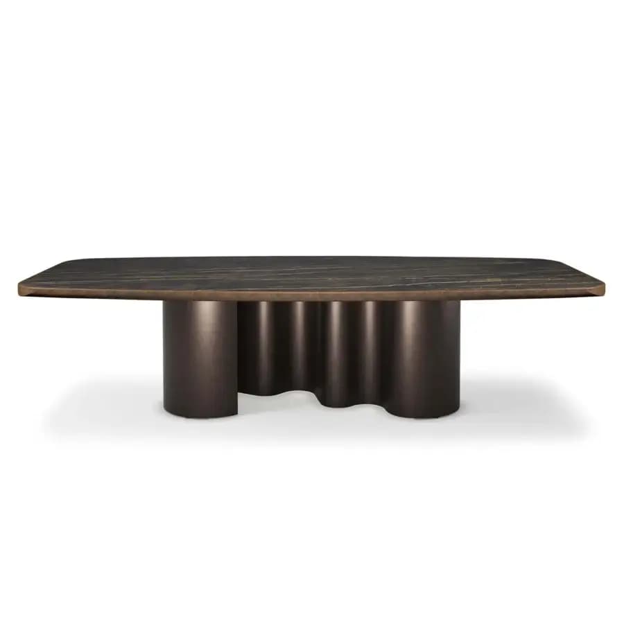 A rectangular coffee table with rounded corners, featuring a dark marble top with subtle white and gold veining. The base consists of two distinct, dark-colored cylindrical supports with a wave-like connection between them, giving a sculptural appearance. — 3D model