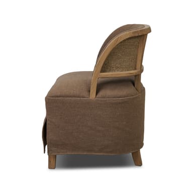 A back view of an armchair featuring a rounded, upholstered seat and backrest with a wooden frame. The wooden frame is composed of curved top and bottom rails connected by vertical supports. The backrest showcases a textured, patterned fabric insert within the wooden frame. The seat is upholstered in a plain, textured brown fabric, and the chair is supported by four tapered wooden legs. — 3D model
