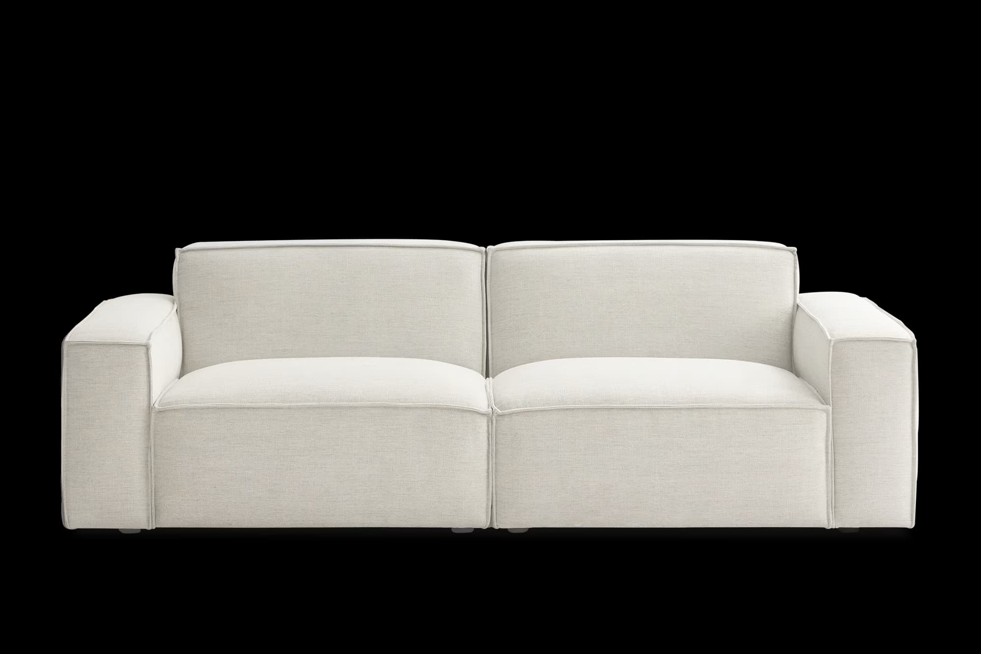 A contemporary two-seater sofa upholstered in a light-neutral, textured fabric, featuring broad, squared arms, individual seat and back cushions, and visible piping along the edges, giving it a structured yet comfortable appearance. — 3D model