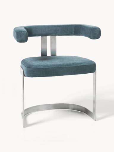 A modern armchair with a metal frame and upholstered seating. The armchair features a curved, open armrest design, a rectangular seat cushion, and a curved sled base. The frame appears to be made of polished metal, possibly stainless steel or aluminum, with a brushed finish. The upholstery is a textured fabric in a deep teal or blue-green hue. — 3D model