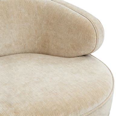 A contemporary curved sofa, viewed from the back, featuring a continuous rounded silhouette. It is upholstered in a light, neutral-toned fabric, possibly a boucle or similar textured material. The sofa is supported by four slender, tapered metal legs with a brass or gold finish, providing a minimalist and elegant foundation. — 3D model