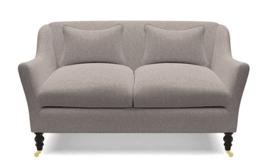 A two-seater sofa upholstered in a textured, light gray fabric. It features a gently curved backrest that extends into short, flared arms. Two matching lumbar pillows are placed on the seat. The sofa is supported by four short, turned wooden legs in a dark finish, with brass casters on the front legs. — 3D model