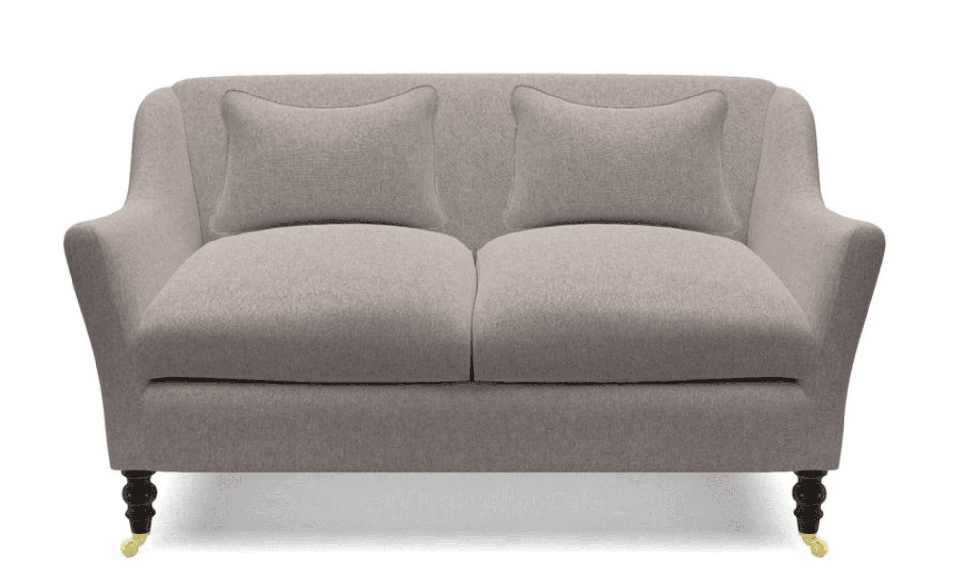 A two-seater sofa upholstered in a textured, light gray fabric. It features a gently curved backrest that extends into short, flared arms. Two matching lumbar pillows are placed on the seat. The sofa is supported by four short, turned wooden legs in a dark finish, with brass casters on the front legs. — 3D model
