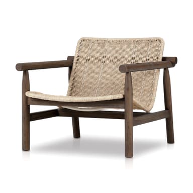 A modern armchair with a wooden frame and a woven rattan seat and back. The armchair features a robust, dark-stained wooden frame with visible grain. The seat and backrest are constructed from tightly woven natural-toned rattan, providing a contrasting texture. The armrests are extensions of the wooden frame, formed by cylindrical wooden pieces. — 3D model