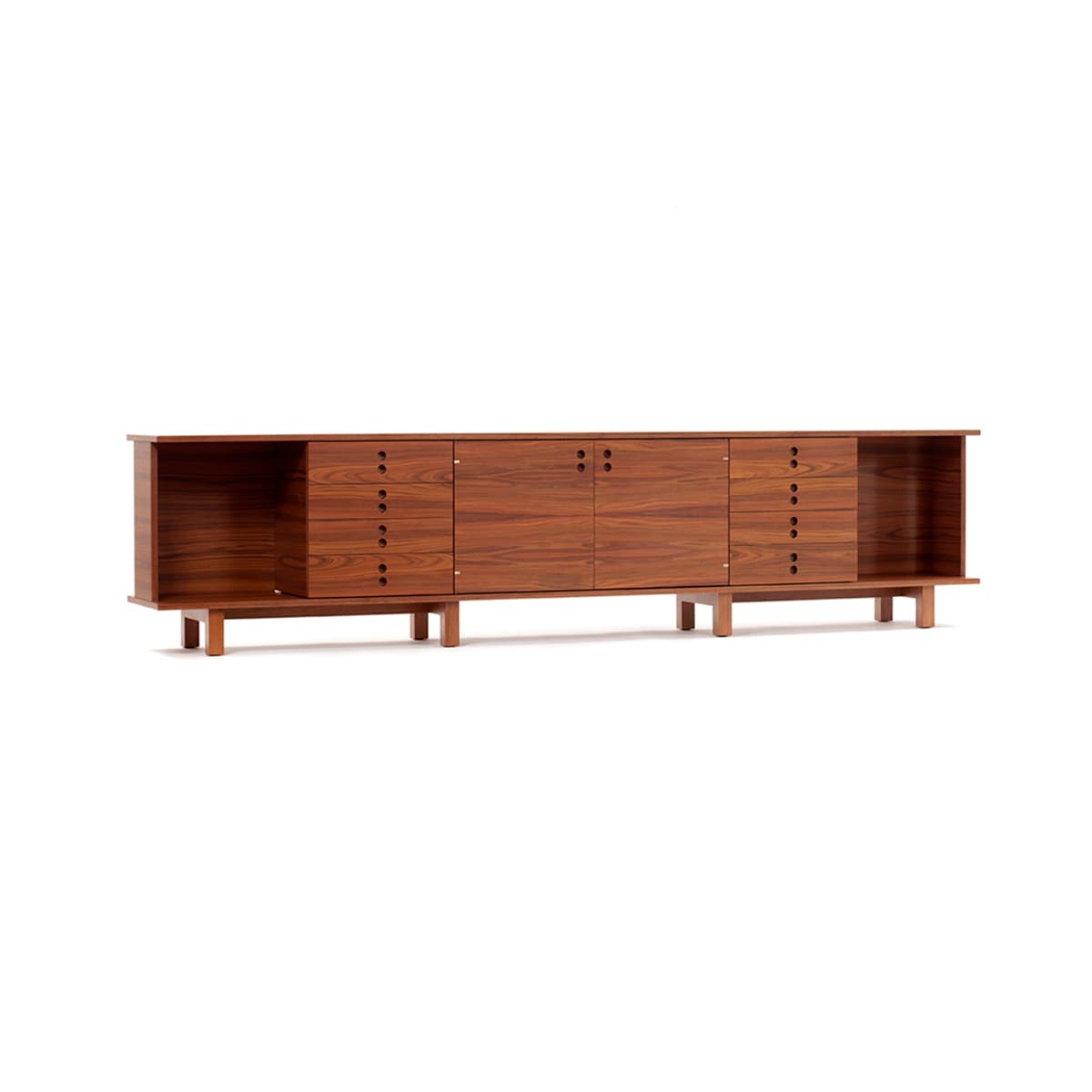 A long, low credenza featuring a warm wood finish. It has a symmetrical design with open shelving on the far left and right ends. The central section is comprised of drawers and cabinets. The drawers are arranged in vertical stacks of five on the left and right sides of the central cabinet doors. The cabinet doors are positioned in the middle and feature subtle circular pulls. The entire unit is supported by a set of four wooden legs, elevating it from the floor. — 3D model