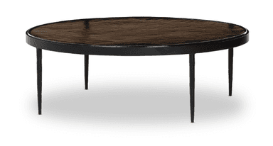 An oval coffee table with a dark, textured top and a thin black frame. It is supported by four slender, tapered black legs. — 3D model