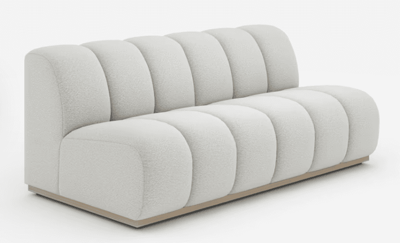 A modern armless sofa upholstered in a light, textured boucle fabric, featuring prominent channel tufting on both the backrest and seat cushions, resting on a low, recessed wooden plinth base. — 3D model