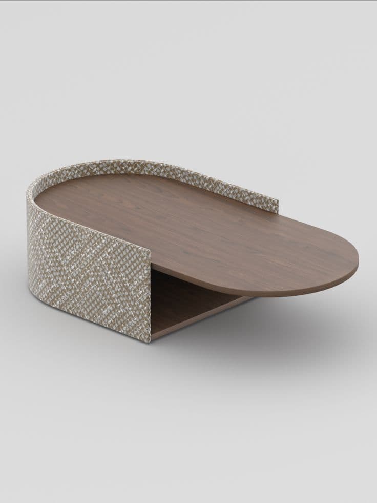 A contemporary low-profile coffee table featuring an asymmetrical teardrop-shaped wooden top and an integrated lower shelf, supported by a curved, half-cylinder base with a textured woven exterior. — 3D model