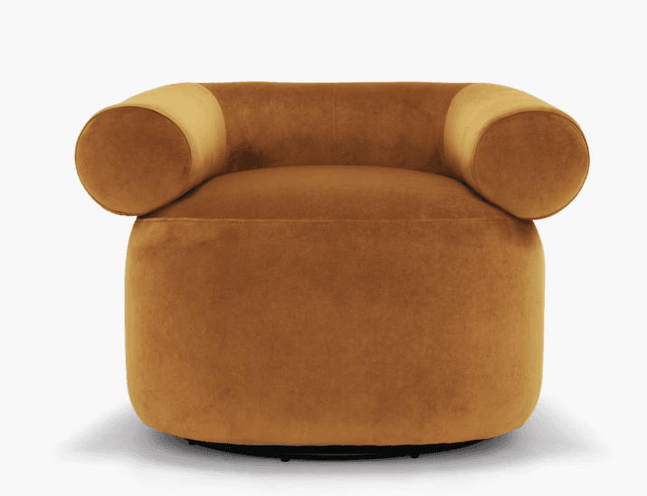 A contemporary lounge chair upholstered in a rich ochre velvet fabric, featuring a rounded, continuous backrest and armrests, and supported by a discreet black swivel base. — 3D model