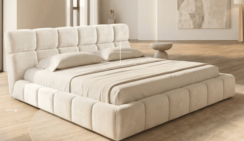 A contemporary upholstered platform bed featuring a distinctive grid-tufted headboard and frame in a soft, light-colored fabric. The low-profile design includes a mattress and bedding in coordinating neutral tones. — 3D model