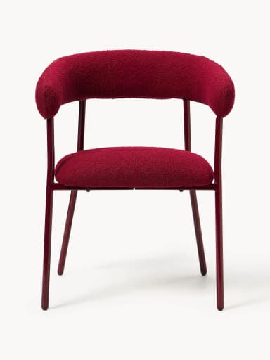 A modern armchair with a curved backrest that extends into armrests. The seat and back are upholstered in a textured, looped fabric. The frame consists of four slender, tapered legs and a support structure for the seat, all finished in a dark red, glossy coating. — 3D model
