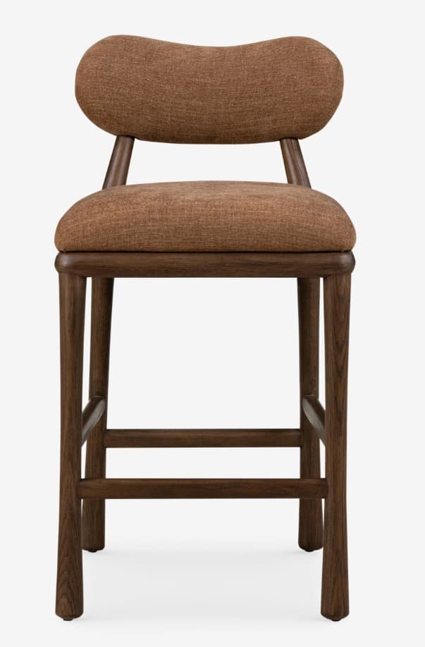A contemporary bar stool featuring a dark stained wooden frame and upholstered seat and backrest. The backrest is distinctly curved and organic in shape, providing lumbar support. The seat is generously padded and rounded. The frame consists of four sturdy, tapered legs connected by integrated footrests for comfort and stability. The upholstery is a textured, rust-brown fabric, complementing the dark wood finish. — 3D model
