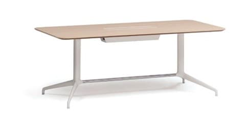 A modern, rectangular conference table featuring a light wood-tone tabletop with softly rounded corners. The table stands on two sturdy, splayed, light-colored metal leg bases connected by a horizontal metal crossbar. A central recessed strip on the tabletop suggests integrated power or cable management, and a discreet, shallow tray is mounted underneath the tabletop. — 3D model