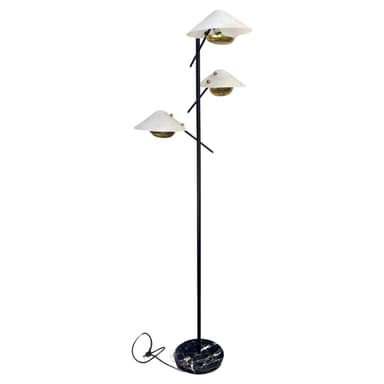 A multi-headed floor lamp with a black metal stem supporting three conical white lampshades. The lampshades are fitted with brass-colored lamp holders and appear to be made of frosted glass or a similar translucent material. The base of the lamp is circular and features a dark marble pattern with white and gold veining. A black power cord is visible near the base. — 3D model