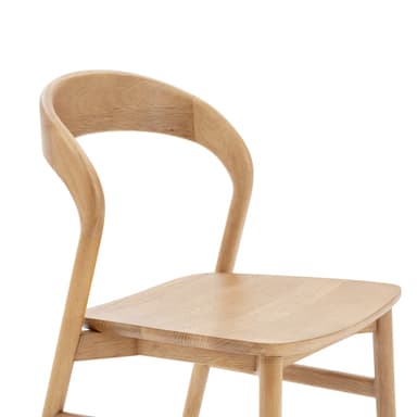 A light-toned solid wood chair, likely oak or ash, featuring a minimalist design with a smoothly curved backrest and a subtly contoured seat. It has four straight, round legs connected by stretchers, and no armrests. — 3D model