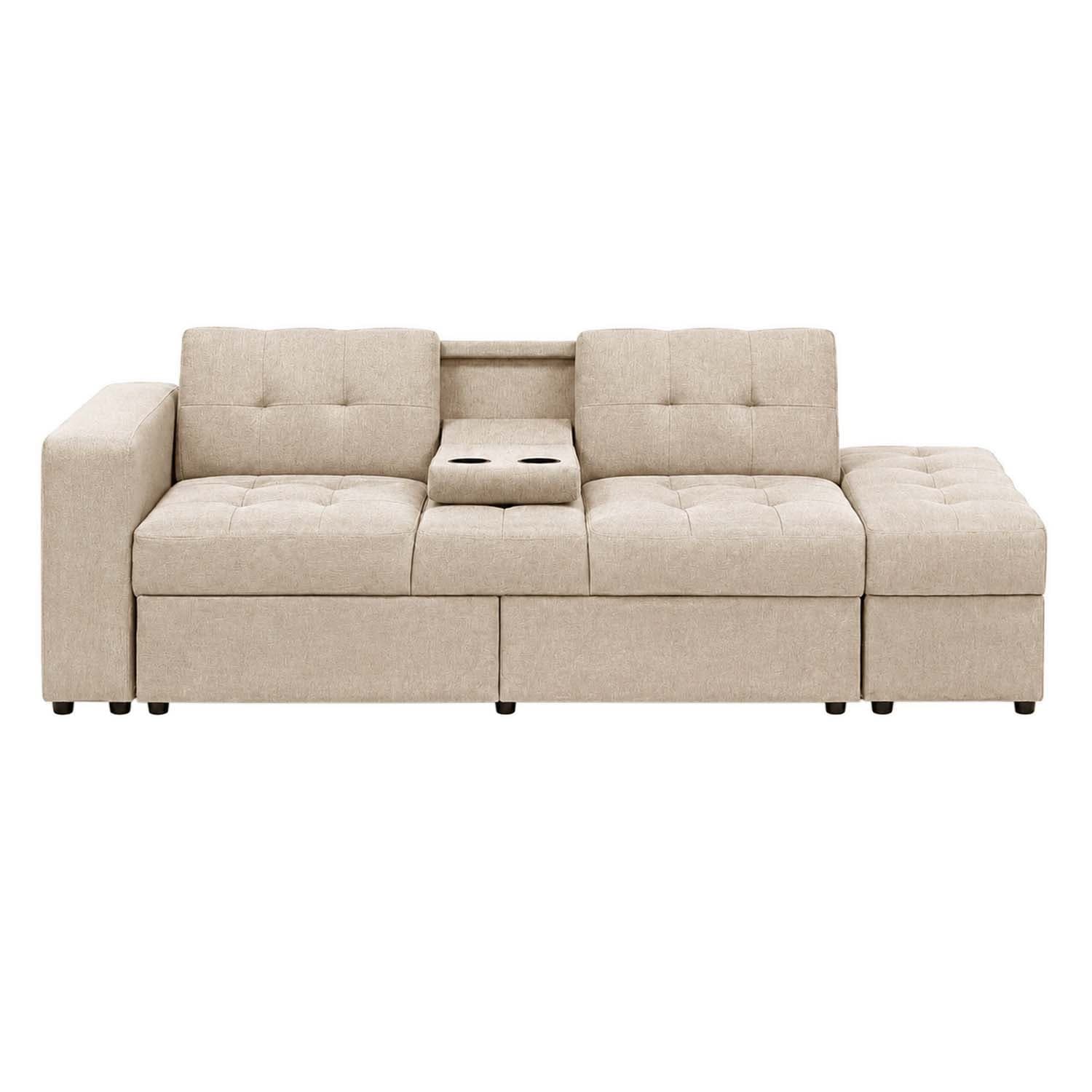 A light beige, modular sectional sofa composed of multiple units, including a console with two cup holders. The sofa features tufted seat and back cushions, track arms on one end, and low-profile dark feet. The upholstery appears to be a textured fabric. — 3D model