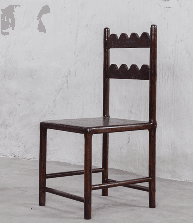 A dark-stained wooden chair featuring a distinctive backrest with two horizontal slats, each carved with a wavy or scalloped edge. It has a simple square wooden seat and straight legs with stretchers. — 3D model