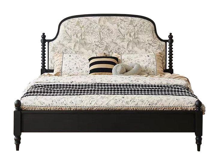 A traditional black-painted wood bed frame featuring an upholstered headboard with a scrolled top edge and turned posts. The fabric on the headboard has a subtle, light-colored botanical pattern. The frame includes side rails, a footboard with turned posts, and a central support beam. — 3D model