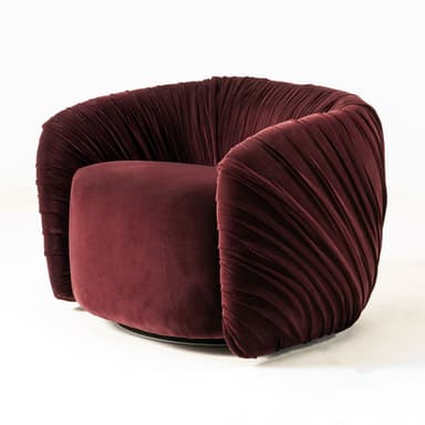 A contemporary lounge chair featuring a rich burgundy velvet upholstery with distinctive, extensive pleating across its curved back and armrests. The chair has a barrel-like form, providing an enveloping and comfortable seating experience. Its base is a discreet, dark-colored swivel mechanism, allowing for rotation. The internal seat cushion is smooth velvet, contrasting with the textured exterior. The overall design exudes a luxurious and modern aesthetic. — 3D model