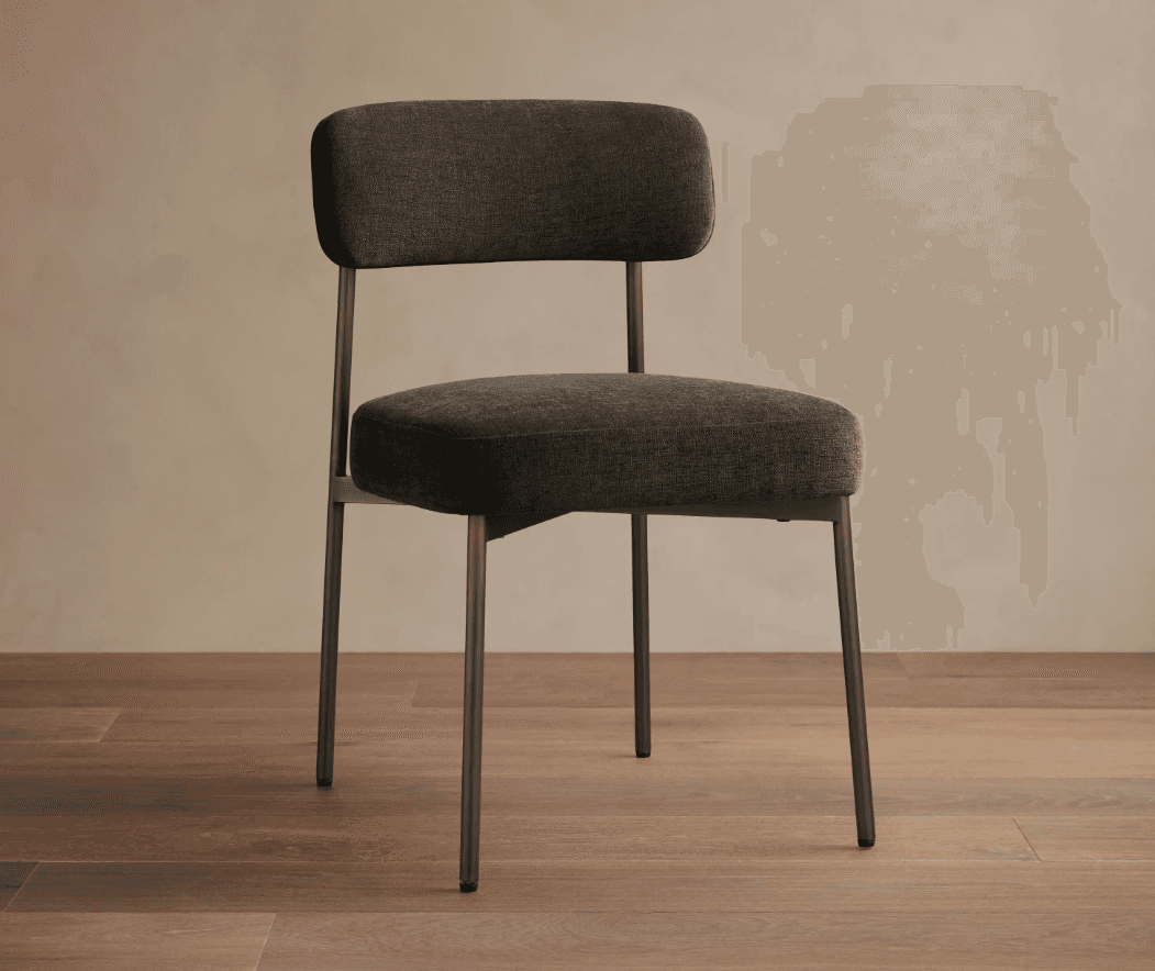 An armless upholstered chair featuring a dark gray fabric seat and backrest, supported by a slender dark metallic frame with four straight legs. — 3D model