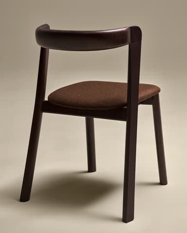 A modern dining chair with a dark wood frame and a fabric-covered seat. The chair features a curved backrest that extends into the rear legs, and the front legs are straight and angled. The seat is upholstered in a textured brown fabric. — 3D model