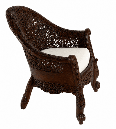 An ornately hand-carved dark wood armchair featuring intricate floral and foliate motifs across its entire frame. The chair has a high, curved backrest and substantial arms, all rendered in deeply carved patterns. It is fitted with a light-colored, possibly cream or off-white, upholstered cushion for the seat. The legs are also carved, ending in scroll-like feet. The overall aesthetic is elaborate and traditional. — 3D model