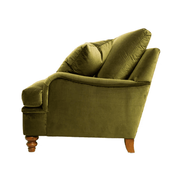 A plush armchair upholstered in a textured, olive-green fabric, featuring a deep seat cushion, a backrest, and rolled armrests. It is complemented by a large, rectangular throw pillow positioned against the backrest. The armchair is supported by four short, turned wooden legs with a dark stain. — 3D model