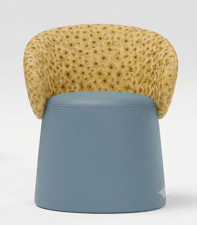 A contemporary sculptural accent chair featuring a unique two-tone design. The low, curved backrest is upholstered in a textured fabric with a detailed, coral-like pattern in muted yellow and tan. The integrated seat and conical, drum-shaped base are covered in a smooth, pale blue faux leather or vinyl material, creating a striking contrast in both color and texture. — 3D model