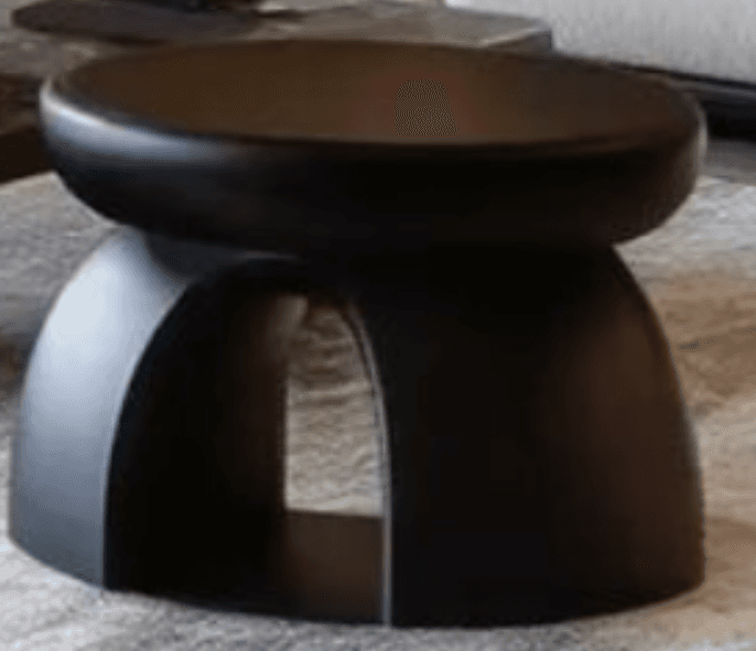 A minimalist, matte black stool with a round top and a curved, arched base. — 3D model