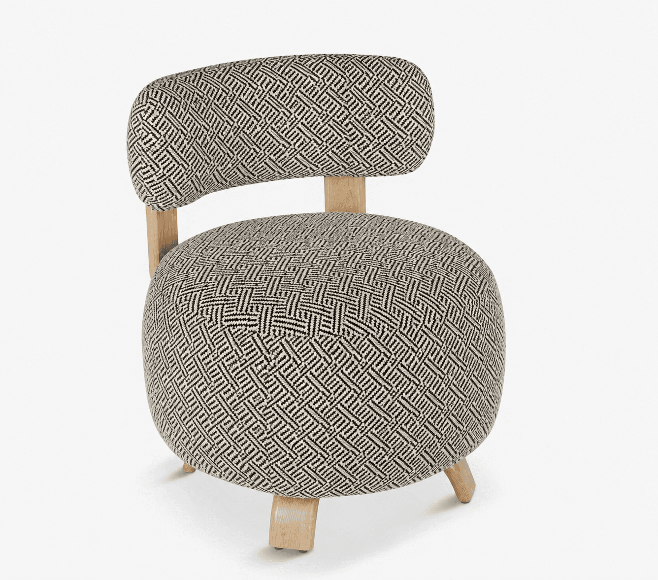 An armless accent chair featuring a distinct geometric black and white patterned upholstery. The chair has a voluminous, rounded seat cushion and a separate, curved backrest, both fully upholstered. It is supported by four splayed, light-toned wooden legs. — 3D model