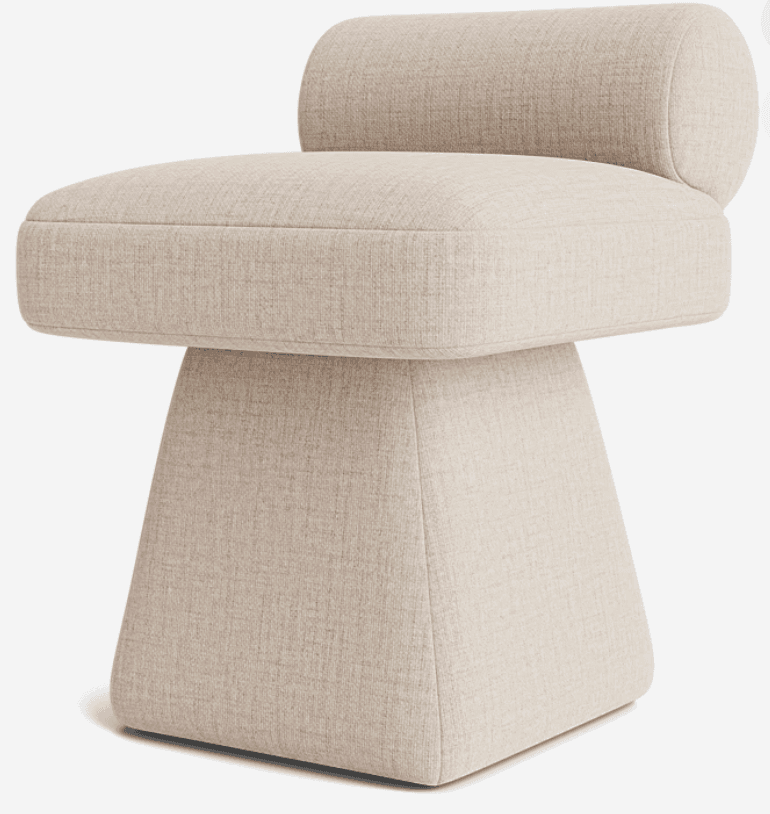 A modern, fully upholstered chair with a distinctive sculptural silhouette, featuring a thick, rounded square seat and a cylindrical bolster backrest. The chair stands on a solid, inverted truncated pyramid base. The entire piece is covered in a textured, light beige fabric. — 3D model