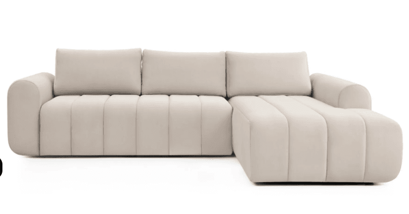 A contemporary sectional sofa featuring a three-seat main section and an integrated left-arm facing chaise lounge. The sofa is upholstered in a soft, light beige or cream fabric and distinguished by its channel-tufted back and seat cushions, rounded armrests, and low-profile design, giving it a plush yet sleek appearance. — 3D model