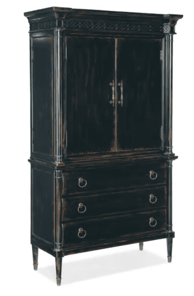A tall, dark wood armoire with two doors on the upper section and three drawers on the lower section. The armoire features decorative molding at the top, fluted columns on the sides of the upper section, and ring-pull hardware on the drawers. The finish appears distressed, with lighter wood tones showing through the dark paint, suggesting an antique or distressed style. It stands on four tapered legs. — 3D model