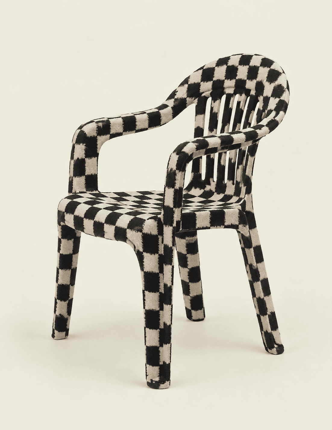 A molded plastic armchair covered in a fuzzy black and off-white checkered textile pattern. It features integrated armrests and a slatted backrest. — 3D model