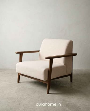 A modern upholstered armchair featuring an exposed dark wood frame and light beige fabric cushions. — 3D model