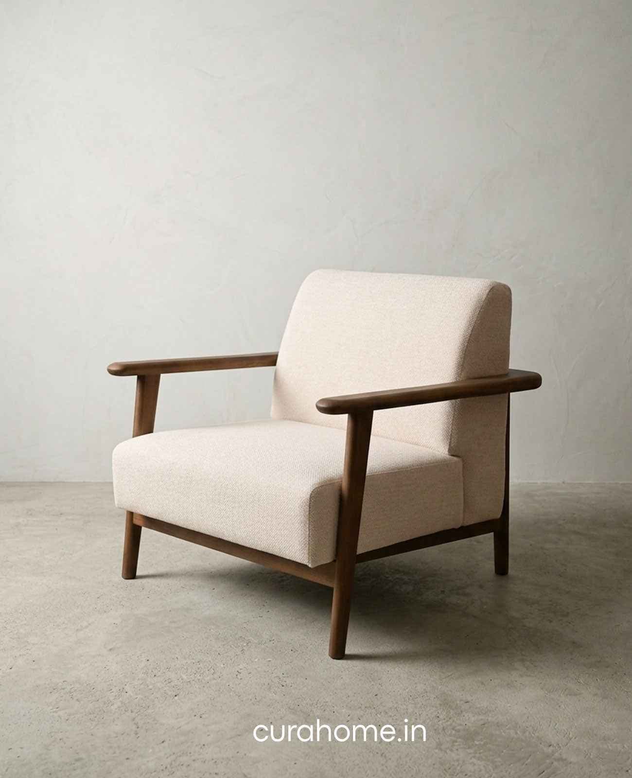 A modern upholstered armchair featuring an exposed dark wood frame and light beige fabric cushions. — 3D model