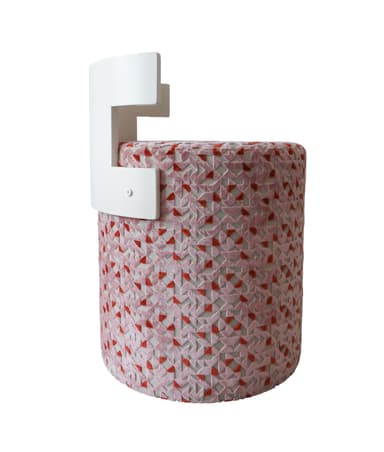 A contemporary cylindrical stool featuring a pink and red geometric patterned upholstery and a distinctive T-shaped white backrest. The base is fully upholstered with a textured fabric, while the backrest provides a clean, minimalist contrast in a solid color. — 3D model