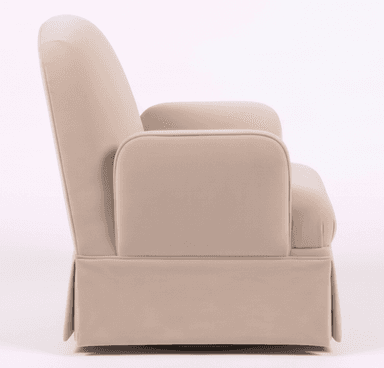 A fully upholstered swivel armchair in a light cream or off-white fabric, featuring a skirted base that conceals the swivel mechanism. The chair has a plush, rounded backrest, soft, slightly rolled armrests, and a deep seat cushion. The overall design is transitional, emphasizing comfort and a clean aesthetic. — 3D model