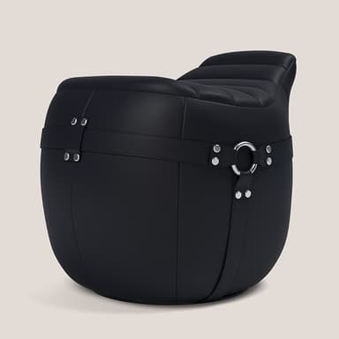 A barrel-shaped upholstered furniture piece, functioning as an ottoman or pouf, covered in black textured material, likely leather or faux leather. It features horizontal strap detailing with silver-toned rivets and D-rings or buckles, adding a decorative and somewhat rugged aesthetic. The top surface appears slightly cushioned. — 3D model