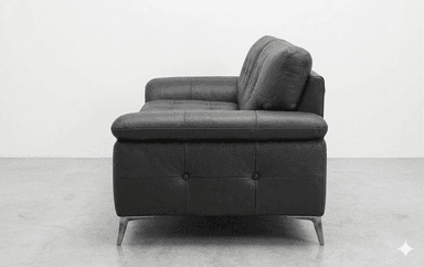 A modern two-seater sofa upholstered in dark gray leather. The sofa features a tufted design on the back cushions and seat cushions, with buttons accentuating the tufts. It has curved armrests and rests on four sleek, silver-toned metal legs. — 3D model