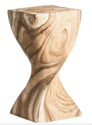 A solid wood accent piece, crafted from light-toned wood with prominent grain. It features an hourglass-like, twisted sculptural form, wider at the top and bottom and narrowing in the middle. The natural finish highlights the organic patterns of the wood. — 3D model