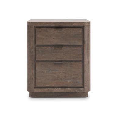 A dark brown, wooden nightstand with three drawers. The nightstand features a rounded edge on the top and sides, and a plinth base. Each drawer has a subtle horizontal metal pull. The wood grain is visible, suggesting a natural wood or wood veneer construction. — 3D model