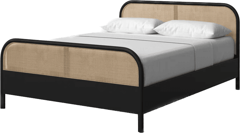 A modern platform bed featuring a black metal frame with rounded corners and natural cane panels integrated into both the headboard and footboard. The bed frame is designed to support a mattress directly, eliminating the need for a box spring. It includes a headboard and footboard with recessed cane webbing, offering a blend of contemporary and bohemian aesthetics. The mattress, pillows, and bedding are white, contrasting with the dark frame. — 3D model