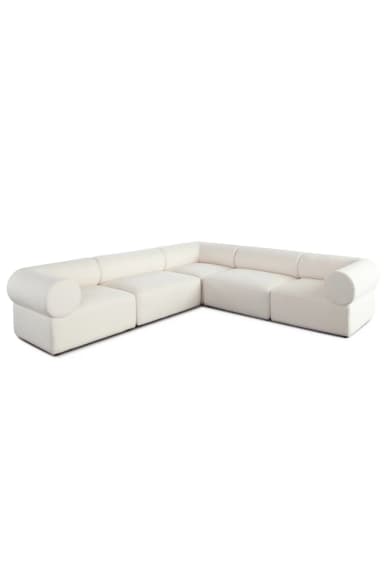 An L-shaped modular sectional sofa upholstered in an ivory or off-white textured fabric, likely bouclé. The sofa consists of multiple individual units combined to form a large seating arrangement, featuring plush, soft lines and rounded arms. — 3D model