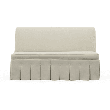 A cream-colored bench with a high back and a skirted base featuring inverted pleats and decorative buttons. The bench has a cushioned seat and backrest, upholstered in a textured fabric. — 3D model