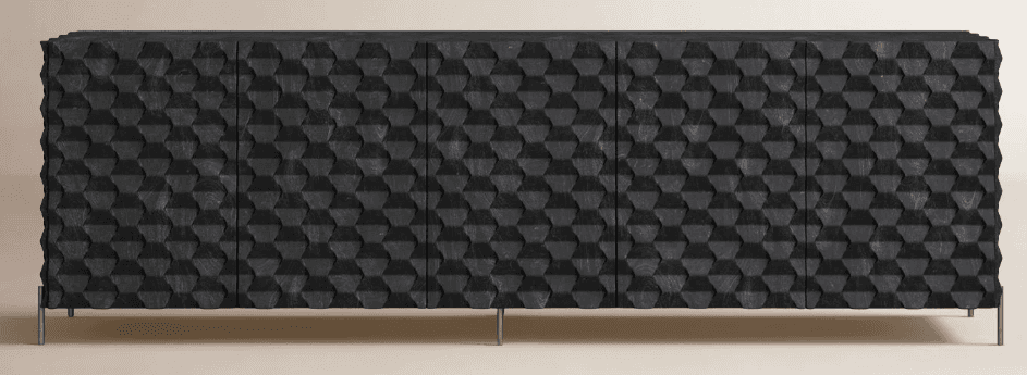 A dark-colored credenza with a highly textured geometric pattern on its front panels, supported by slim metal legs. The pattern consists of repeating hexagonal and rhombus-like shapes that create a three-dimensional, faceted surface. It features four doors, indicated by vertical seam lines across the front. — 3D model