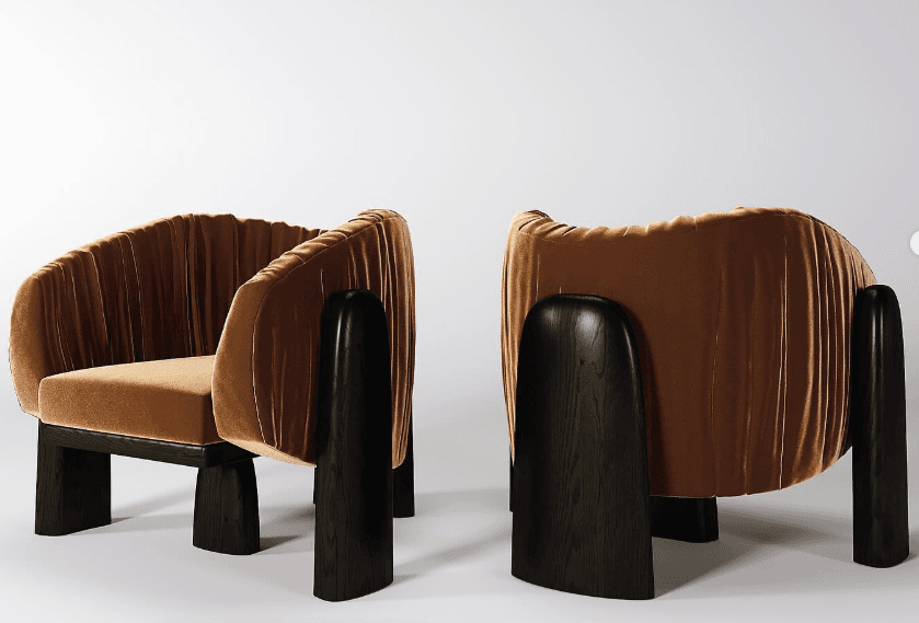 An upholstered lounge chair featuring a barrel-back design, covered in pleated burnt orange velvet, with integrated dark stained wood armrests and legs. — 3D model