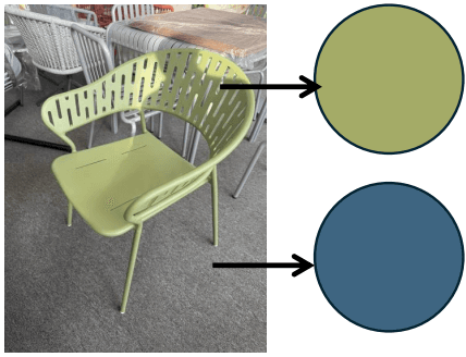 A modern pale green armchair featuring a perforated backrest and integrated armrests, constructed from what appears to be powder-coated metal with tapered legs. — 3D model