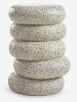 A tall, cylindrical stool or side table composed of five stacked, rounded, ring-like segments, finished in a speckled grey and off-white composite material resembling granite or concrete. — 3D model